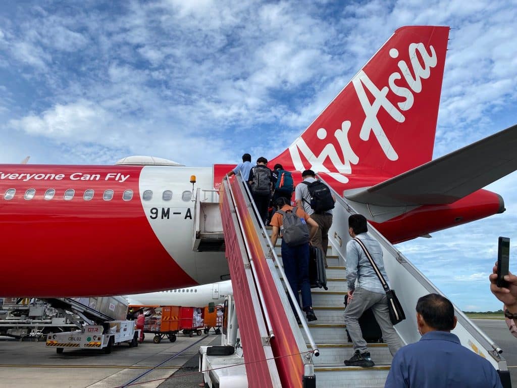 Passengers boarding an AirAsia plane, ranked among the best budget airlines 2025 for affordable routes across Asia and beyond.