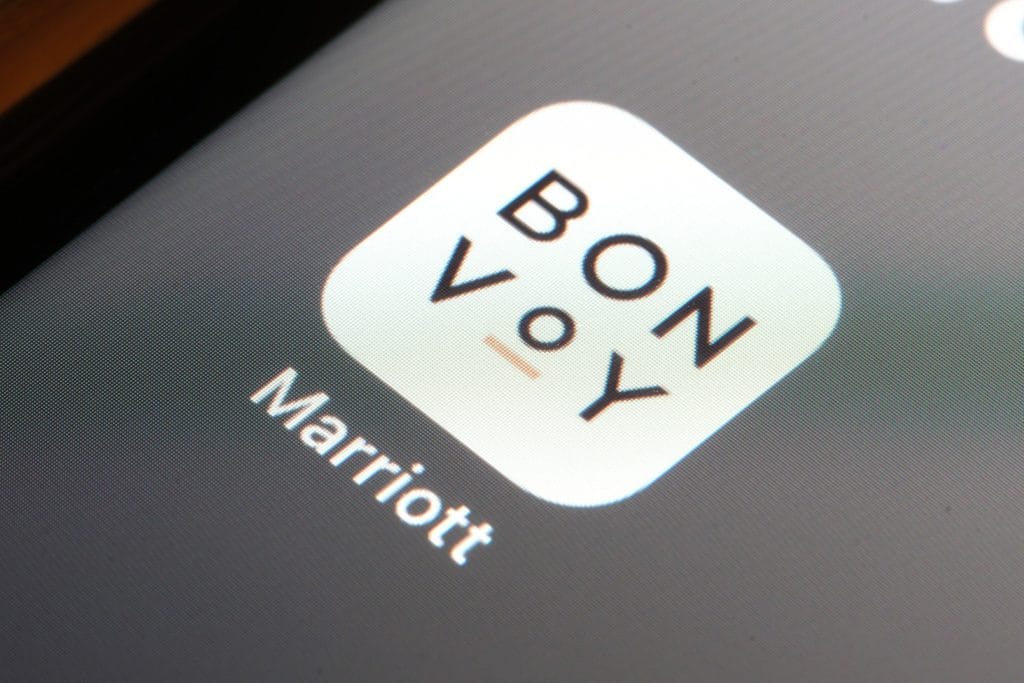 Marriott Bonvoy app being shown as an excellent tool for saving on travel using points.