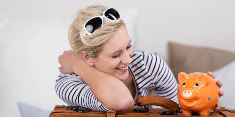 Happy traveler starting her travel with a free hotel room a rewarding outcome of smart hotel points tips.