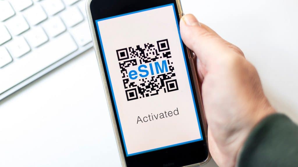 Smartphone showing activated QR code, a simple step in how to get an eSIM.