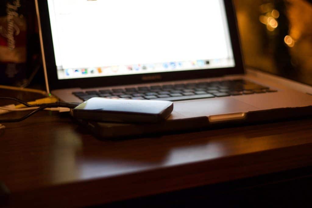 Light weight laptop with external hard drives as part of a compact remote work gear setup