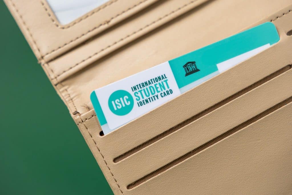 ISIC card in wallet, the key to unlocking student travel discount benefits worldwide.