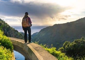 Traveler enjoying ocean view on Madeira levada walks