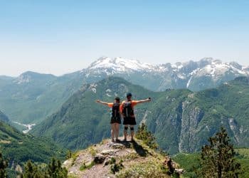 Hikers enjoying mountain views in Durmitor during Montenegro travel