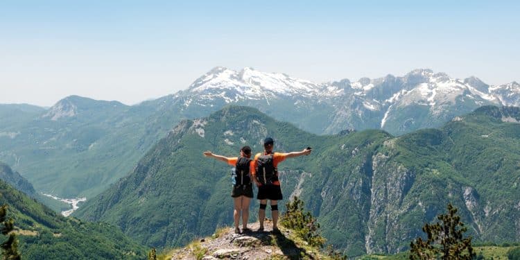 Hikers enjoying mountain views in Durmitor during Montenegro travel