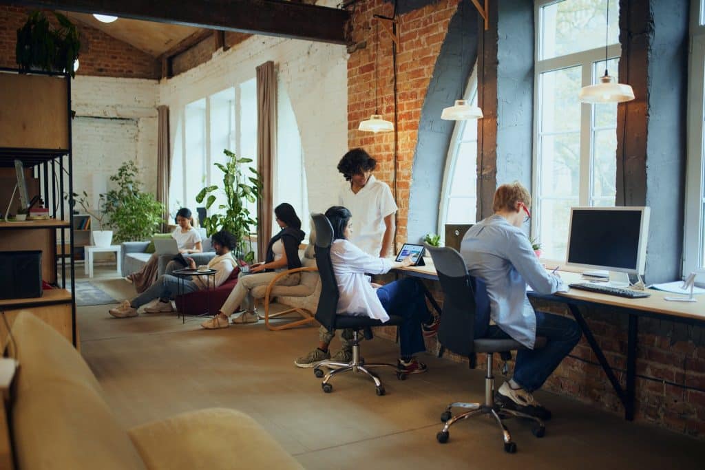 Freelancers sharing a coworking space together to stay productive