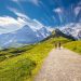 Hikers on Swiss alpine trail, swiss mountain huts guide