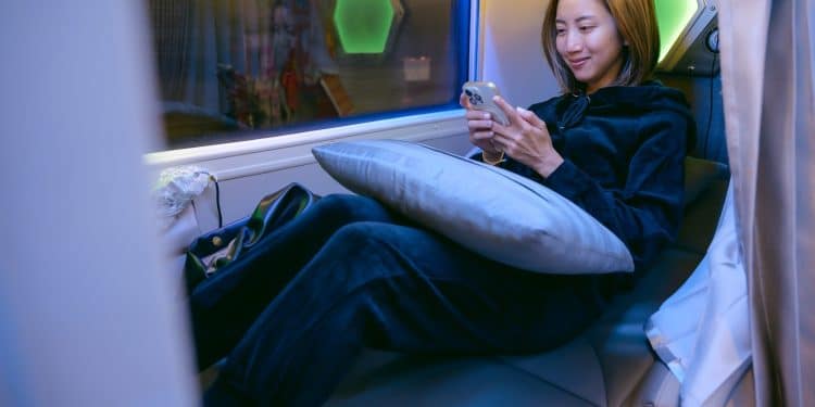 Woman reading with Vietnam sleeper bus tips