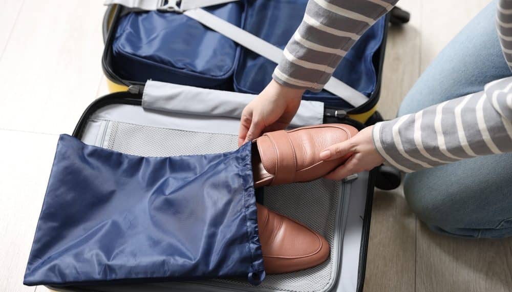 The $1 Item That Keeps Your Dirty Shoes Off Your Clothes While Traveling