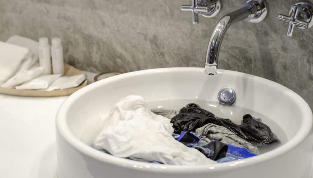 How to Wash a Week of Clothes in a Hotel Sink
